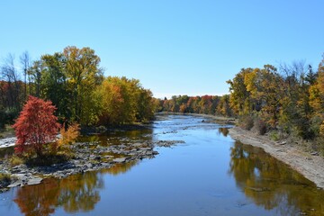 Landscape with river and autumn foliage.