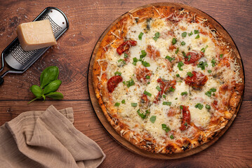 Food photography of pizza with cheese, mozzarella, parmesan, tomato, basil