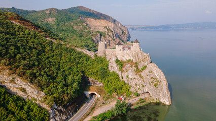 Fototapeta na wymiar Aerial photography of Golubac medieval fortress located on the Danube river on Serbian bank. Photography was shot from a drone at higher altitude with camera level for a panoramic shot.