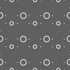 Vector illustration. Geometric seamless pattern. Solid dots and linear circles in rows. Spotted grey, black and white background. Simple monochrome abstract pattern.