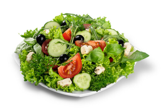 Individual side serving of delicious fresh Greek salad with feta cheese, olives, tomatoes and salad greens
