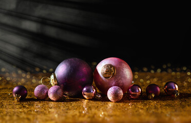 Merry Christmas and Happy New Year! Christmas toys on a gold and black background