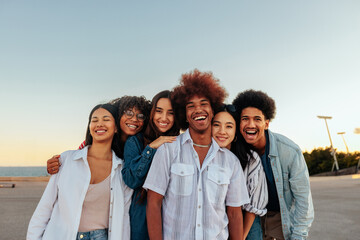 Multiracial friends outdoors portrait.