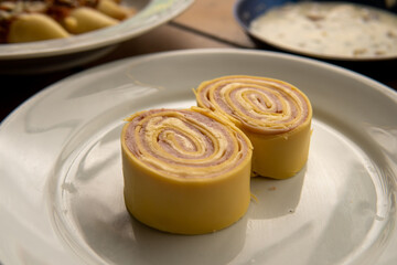 Italian pasta rondelli with ham and cheese