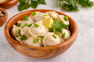 Homemade meat dumplings - russian pelmeni.