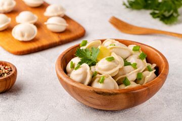 Homemade meat dumplings - russian pelmeni.