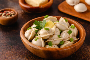 Homemade meat dumplings - russian pelmeni.