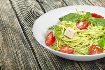 Pasta noodle dish in plate, tasty food concept.