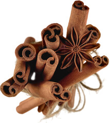 Cinnamon sticks and stars anise over white background