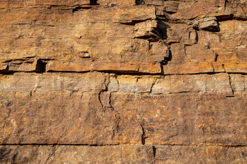Stone texture detail, close up shot of rock surface for background and design.
