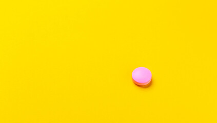 medical pills close-up on a yellow background