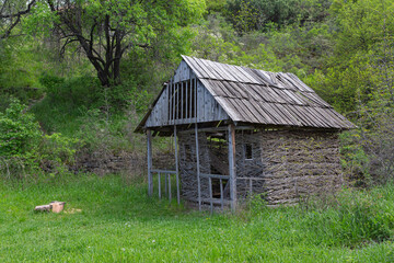 Traditional Georgian wooden farm building in Tbilisi Open Air Museum of Ethnography. Georgia country