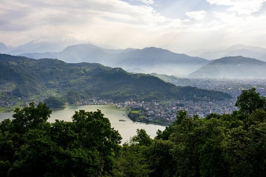 Aerial view of Phewa lake and the Annapurna Himalaya Mountain Range in Pokhara city, Nepal