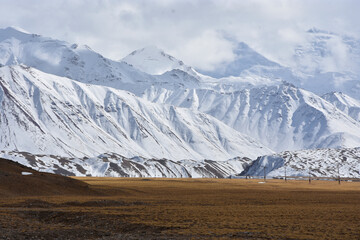 Snow-capped peaks of the Pamir Mountains in Kyrgyzstan