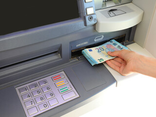 automatic ATM to withdraw money in European 20 Euro banknotes in Europe