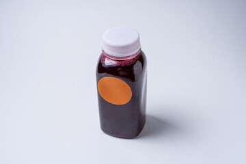 blackcurrant drink in a plastic bottle