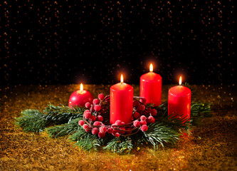 Merry Christmas. Four red burning candles and fir branches