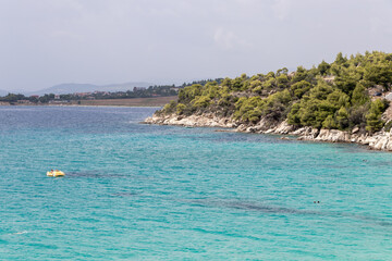 Akti Koviou beach on Sithonia peninsula, Chalkidiki, Greece. Summer vacation travel holiday background concept.