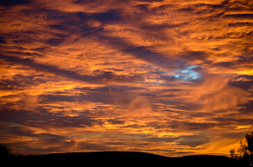 scenic view of dramatic sky during sunset