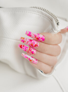 Beautiful stylish pink art manicure on long nails. Art manicure design ideas.