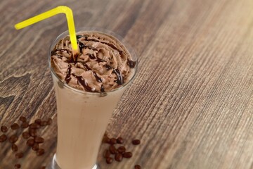Iced americano coffee with coffee beans, Glass of black coffee, Beverage at coffee shop.