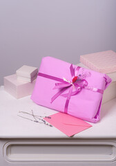 Bright colored paper gift wrapping on a light background