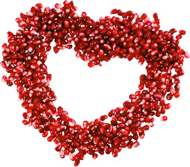 Pomegranate seeds in shape of heart isolated on white