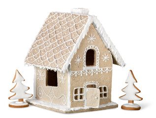 Homemade gingerbread house on brown background