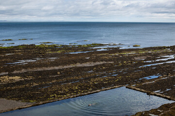 Pool on the beach at Saint Andrews, Castle Sands. Scotland.