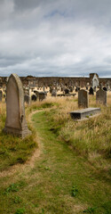 Ancient graves in the churchyard of Saint Andrews Cathedral in Scotland