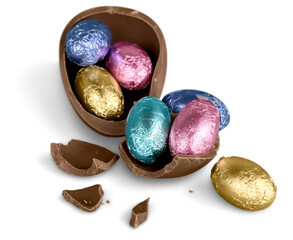 Broken chocolate Easter egg with colorful candies on white background