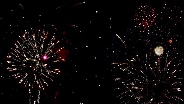 Real fireworks display on dark sky, new year celebration