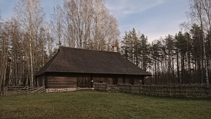 Fototapeta na wymiar Old wooden farm building in the Estonian open air museum, Tallinn