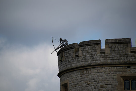 London, UK - April 2015 : Archer sculpture,  part of an exhibition at the Tower of London, metalwork soldiers defend the tower from invaders