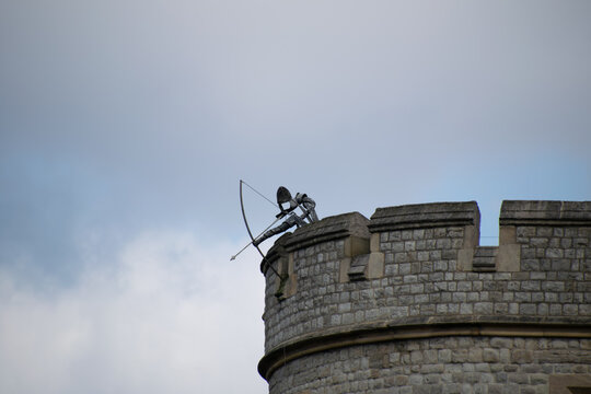 London, UK - April 2015 : Archer sculpture,  part of an exhibition at the Tower of London, metalwork soldiers defend the tower from invaders