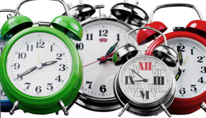 Retro alarm clocks on table  background