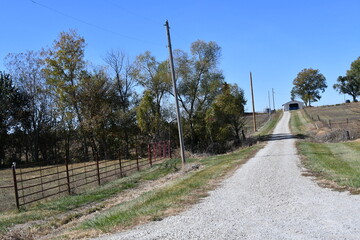 Gravel Road by a Farm Field