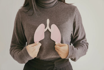 Woman hands holding lung, world tuberculosis day, world no tobacco day, lung cancer,  Pneumonia...