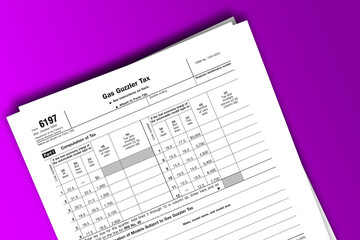 Obraz premium Form 6197 documentation published IRS USA 07.17.2012. American tax document on colored