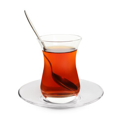 Glass of traditional Turkish tea with spoon isolated on white