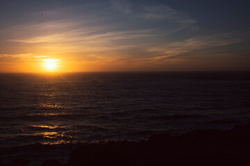 Sun setting over the Oregon Coastline at Devil's Punchbowl Natural Area.  