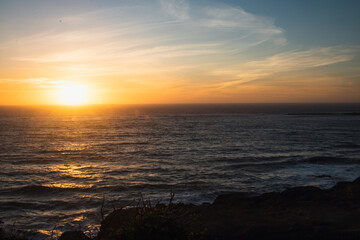 Sun setting over the Oregon Coastline at Devil's Punchbowl Natural Area.  