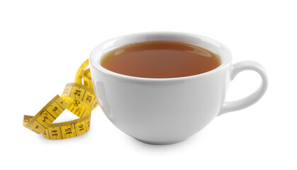 Ceramic cup of diet herbal tea and measuring tape on white background. Weight loss