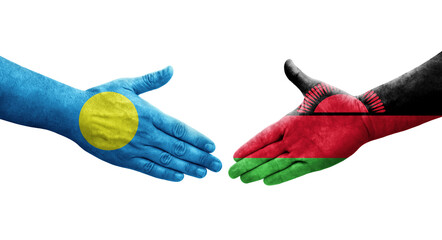 Handshake between Malawi and Palau flags painted on hands, isolated transparent image.