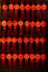 Colorful paper craft lantern festival at Wat Phra That Hariphunchai Lamphun Thailand.