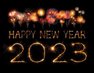 2023 happy new year fireworks celebration written sparkling at night.