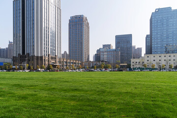 Obraz premium city park with modern building background in shanghai