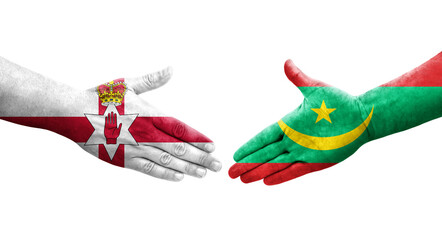 Handshake between Mauritania and Northern Ireland flags painted on hands, isolated transparent image.