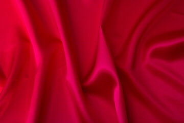 Obraz premium Close up of dark red silk background