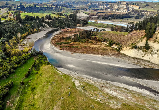 an aerial landscape image of the Mangaweka River with steep white cliffs on the North Island of New Zealand